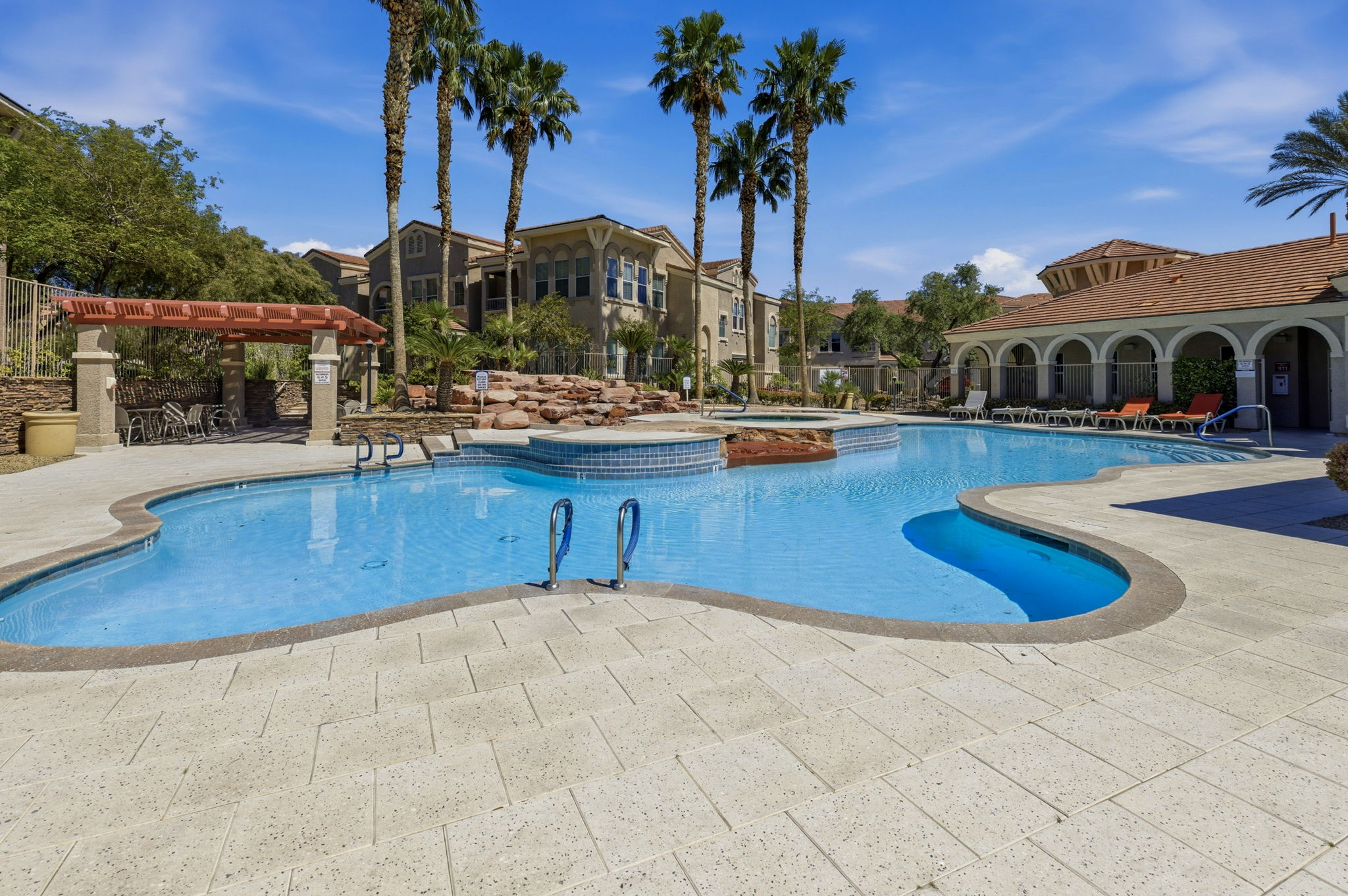 Relax under Vegas palms at your clubhouse.