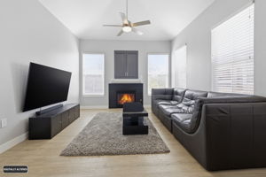 Custom built in storage over fireplace.