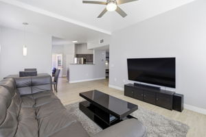 Flow from living to kitchen to balcony.