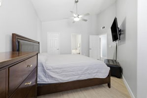 Primary bedroom flow into bathroom area.