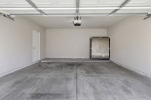 Two car garage with automatic opener.