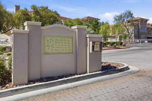 Residential entry is gated with a call box.
