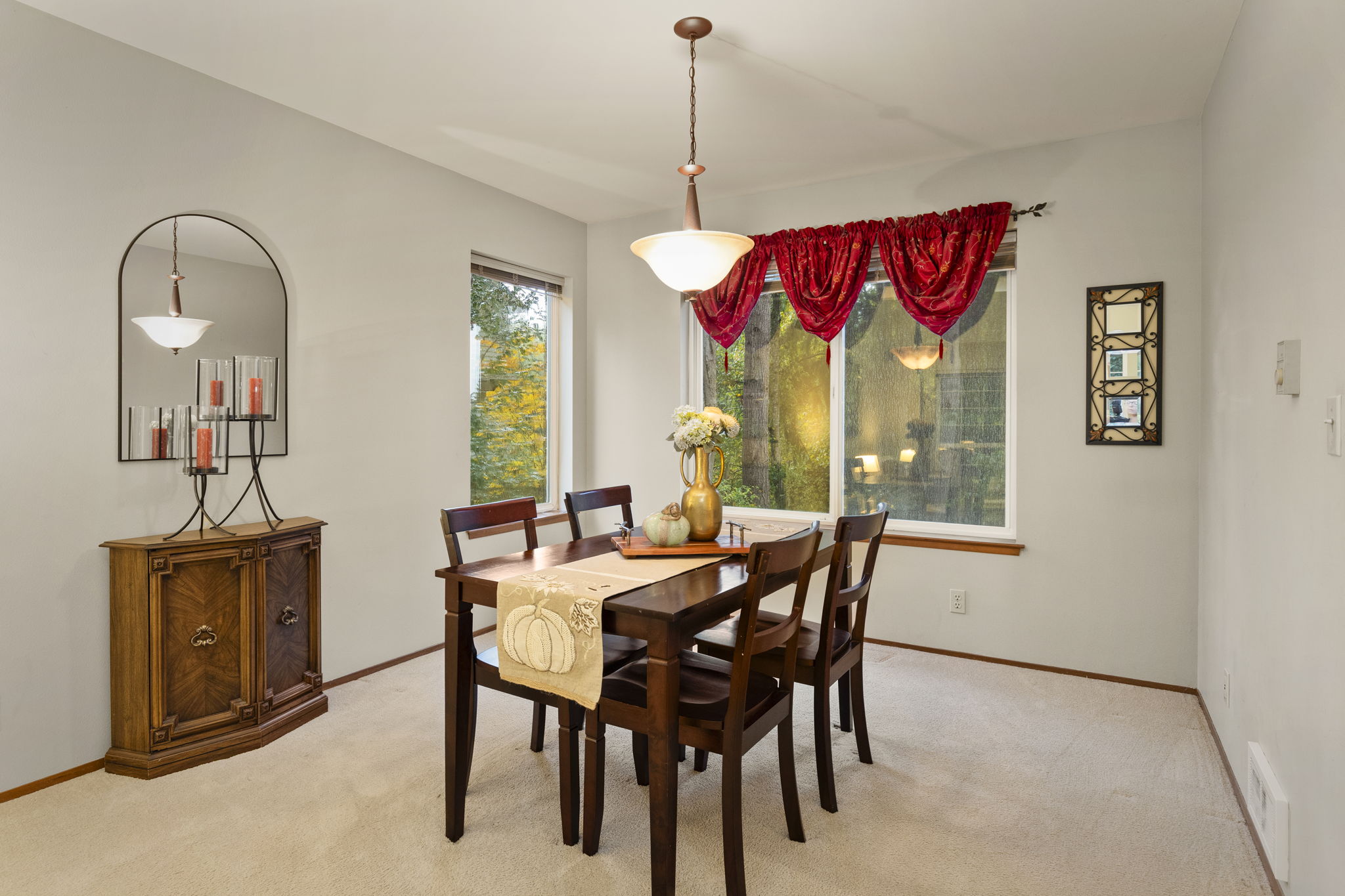Formal dining with views to the backyard.