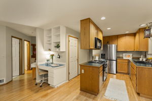 Kitchen with beautiful oak hardwood floors. Large pantry!