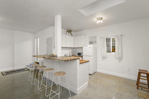 Converted 2 car garage space with kitchen...could be easily converted back to garage.