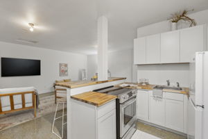 Converted 2 car garage space with kitchen...could be easily converted back to garage.