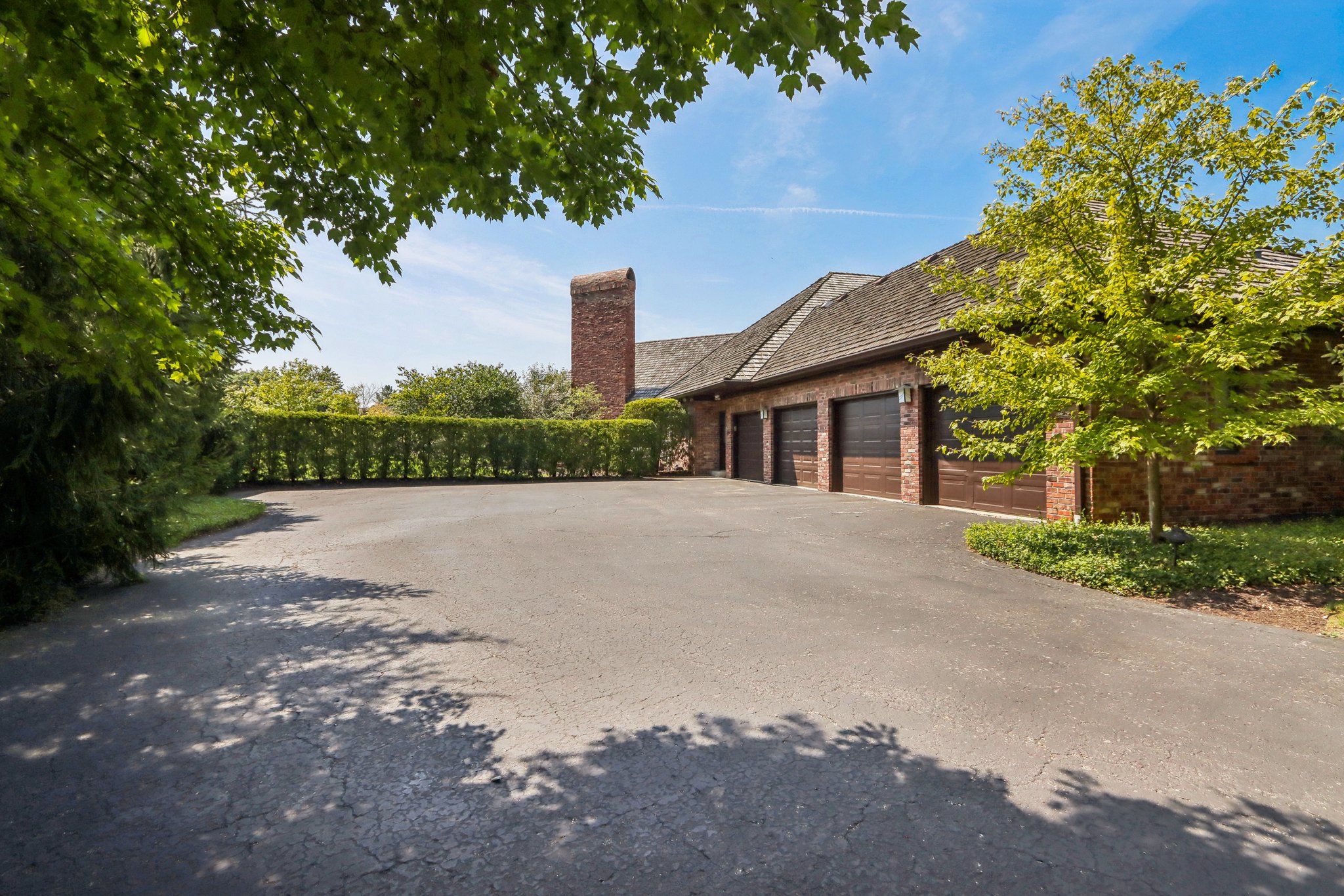 Driveway + oversized 4-car side load garage
