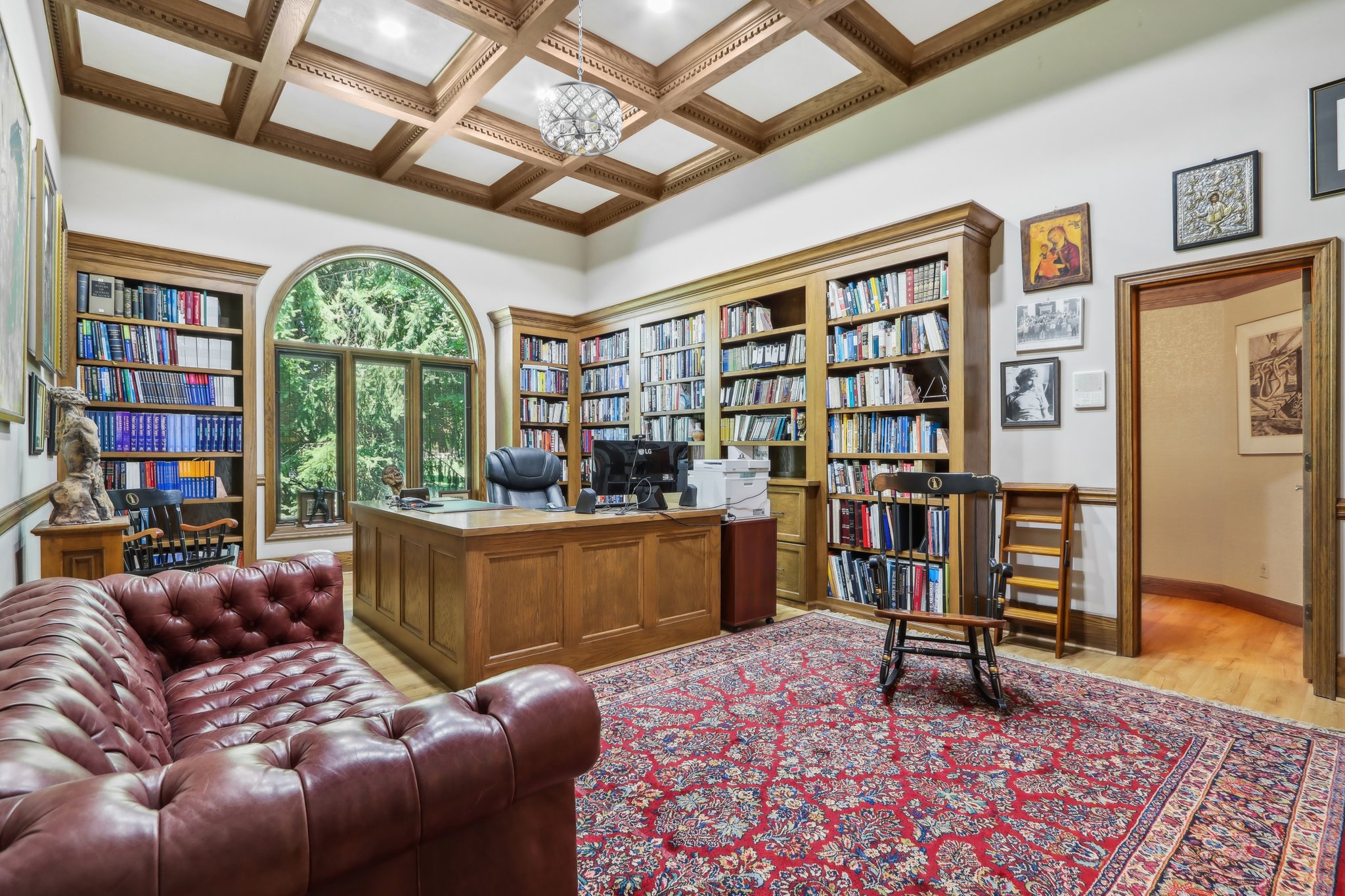 Bedroom #2- being used as an office/library with stunning coffered ceiling and built-in bookshelves