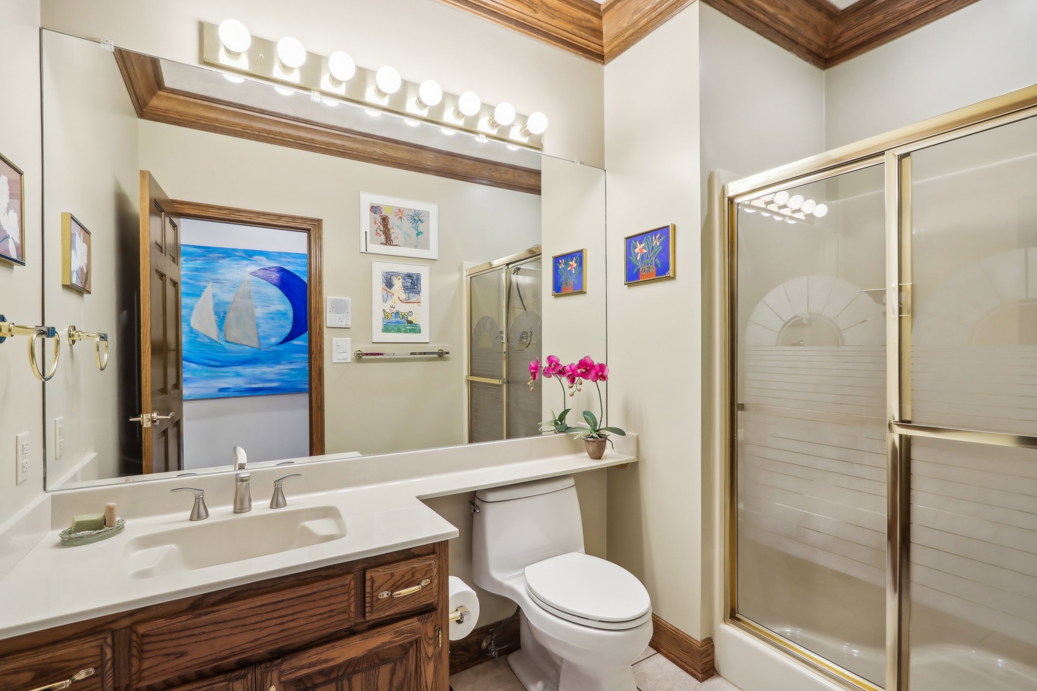 Full bathroom by back door and laundry room