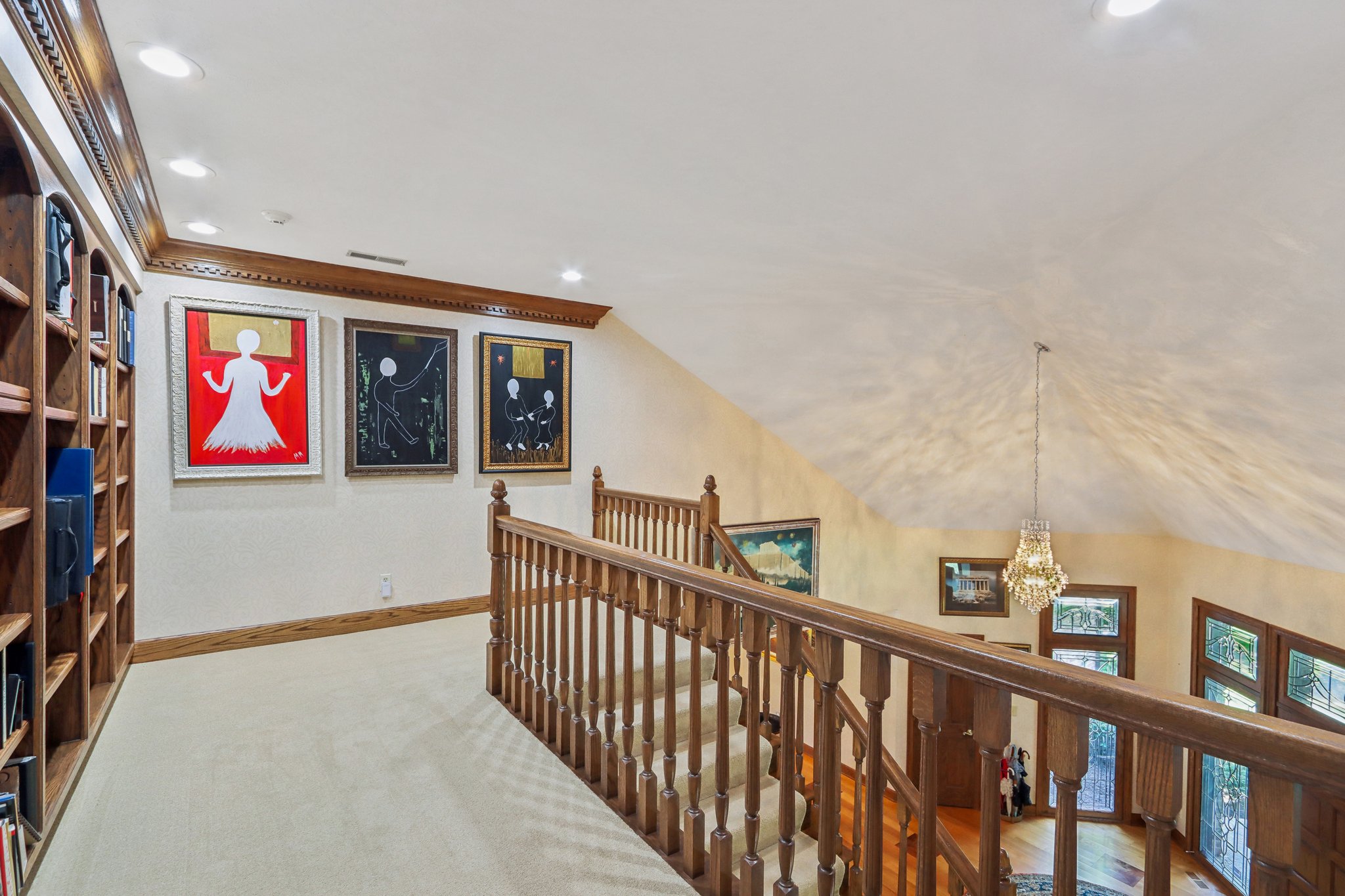 Upstairs landing with built-in bookcases