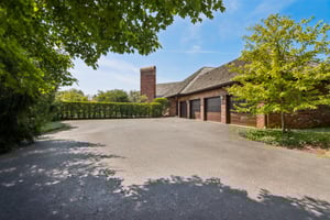 Driveway + oversized 4-car side load garage