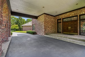 Porte-cochere covered entry at front door