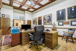 Bedroom #2- being used as an office/library. Bookshelves and desk are included