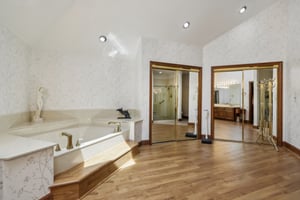 Primary bathroom featuring jacuzzi tub