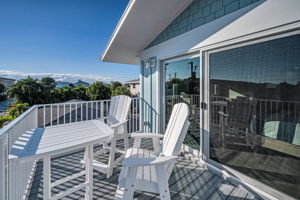Unit A Upper Level Primary Bedroom1 Balcony3