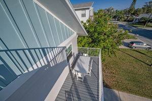 Unit A Upper Level Primary Bedroom1 Balcony5 View