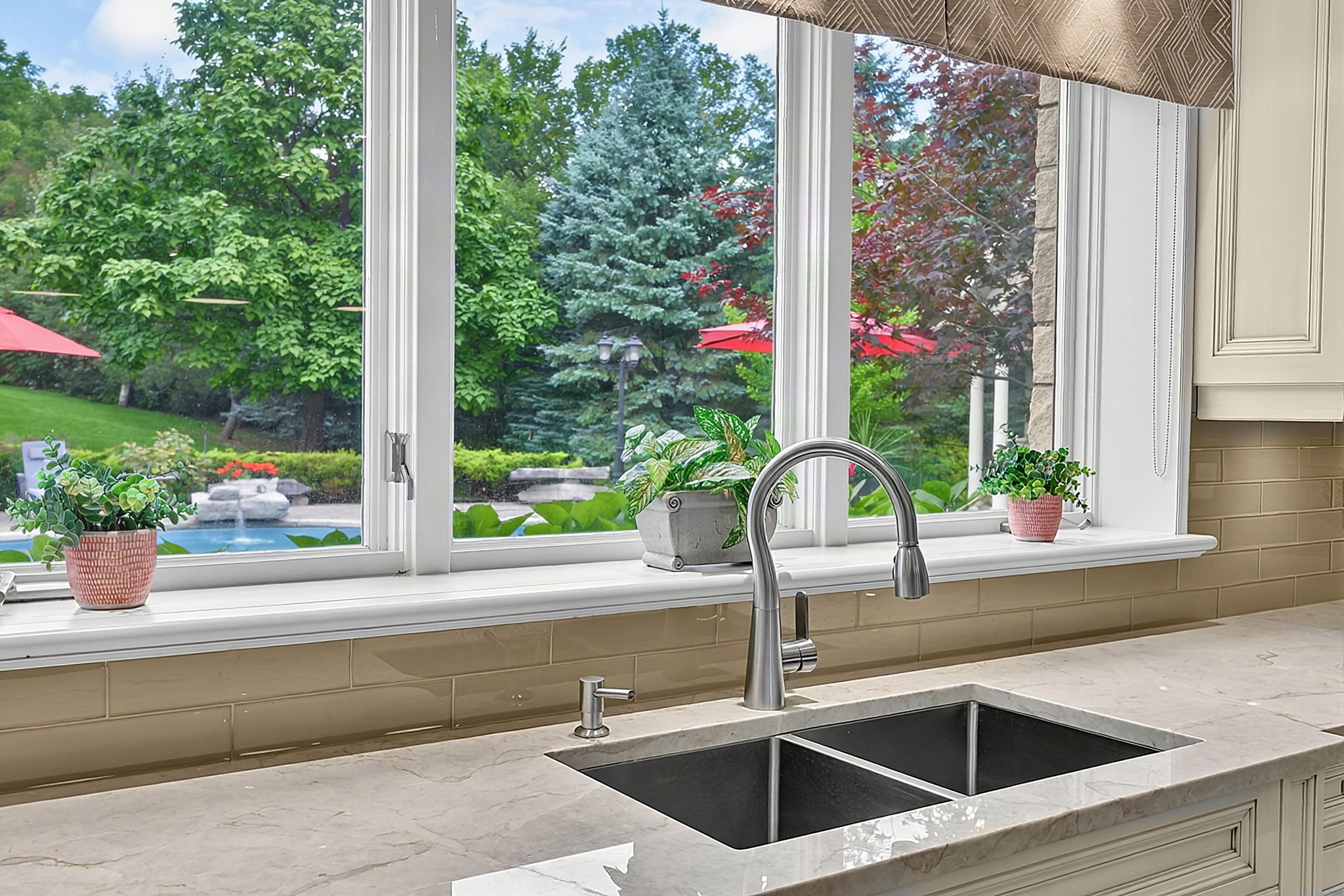 Basement Kitchen Pool and Ravine Views