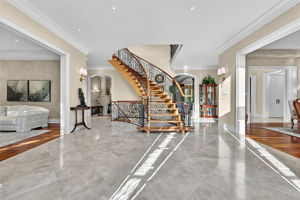 Light-filled Foyer with Limestone Flooring