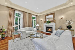 Living Room wiith Traditional, Clean-Lined Marble Fireplace