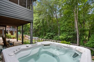 View from the Hot Tub into the Backyard and Woodsline