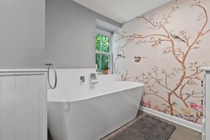 Soaking Tub with Custom Mural and Heater Floors Downstairs Main Dwelling