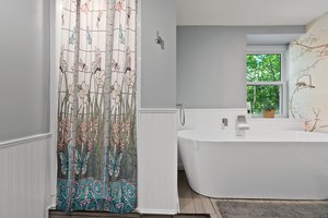 Bathroom with Shower and Soaking Tub Downstairs Main Dwelling