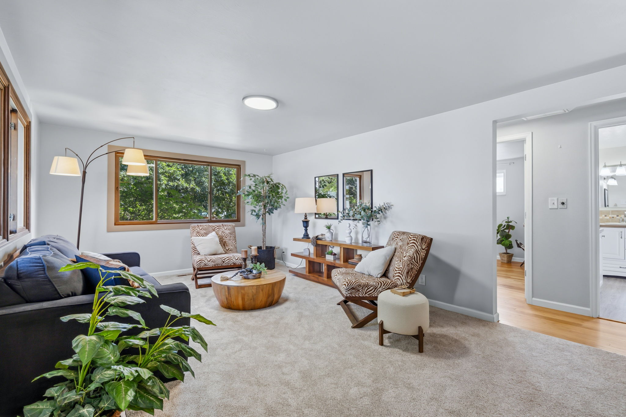 Big windows allow natural light to flood this room.