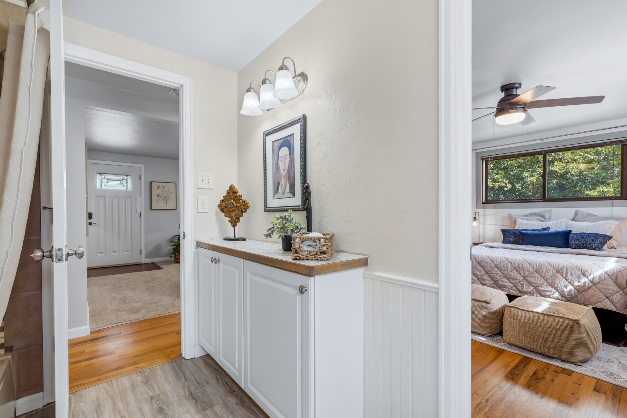 Shared bathroom with entrance from primary bedroom and hallway