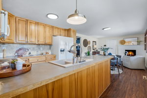 Beautifully updated kitchen that opens into dining and a second living space.
