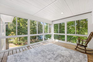Screened in Patio Overlooking the Serene Wooded Backyard