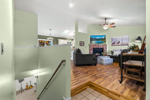 Head downstairs for more bedrooms and living spaces plus a bathroom and storage!
