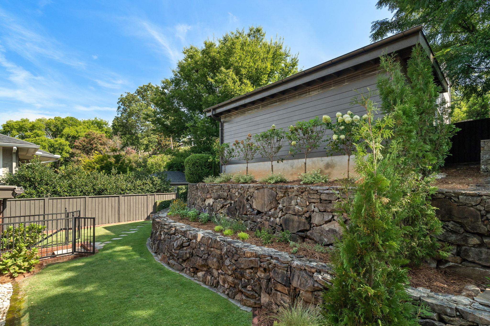 Private Back Yard w/ Stacked Stone Flower Beds