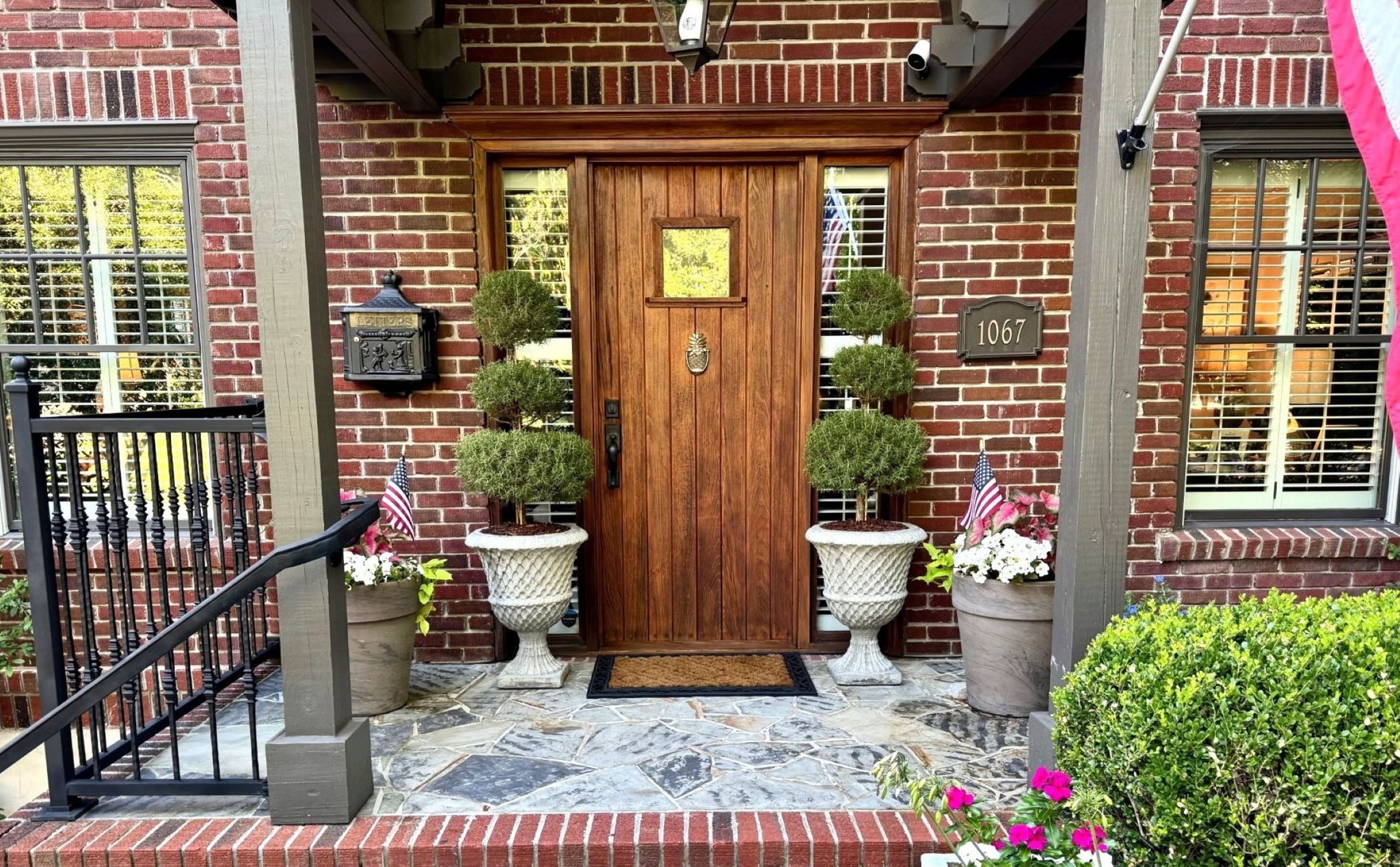 Welcoming Front Porch with Barrel Ceiling