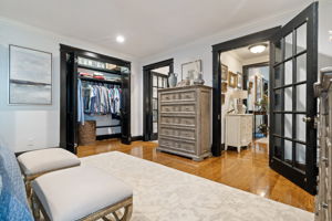 Two Closets with Custom Wood Shelving