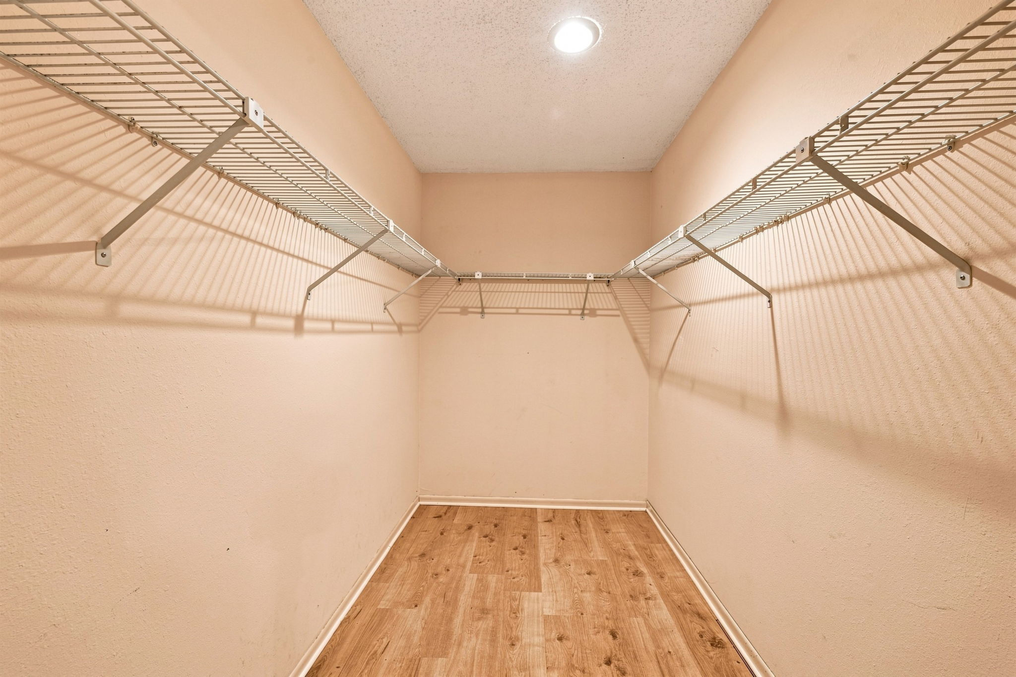 Primary Bedroom Walk-in Closet