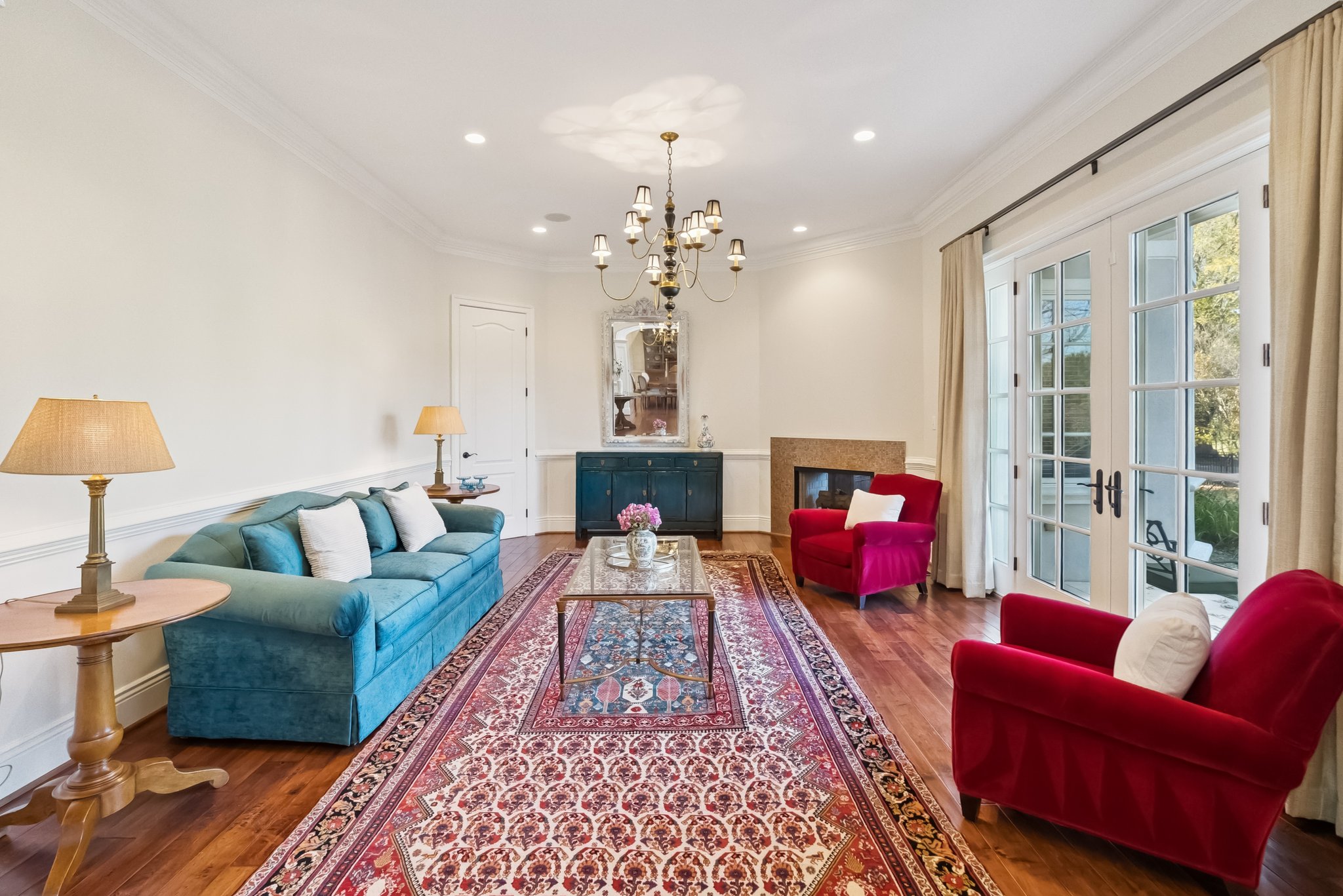 Formal Living Room with Fireplace and Double French Doors