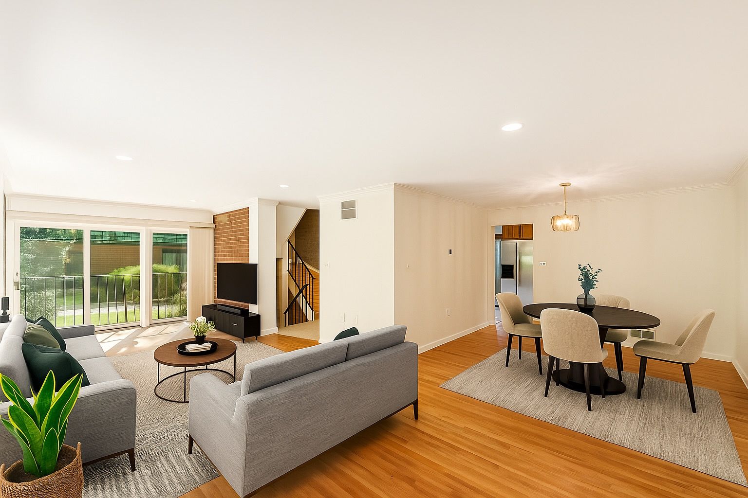 Living Room open to Dining Room & Balcony