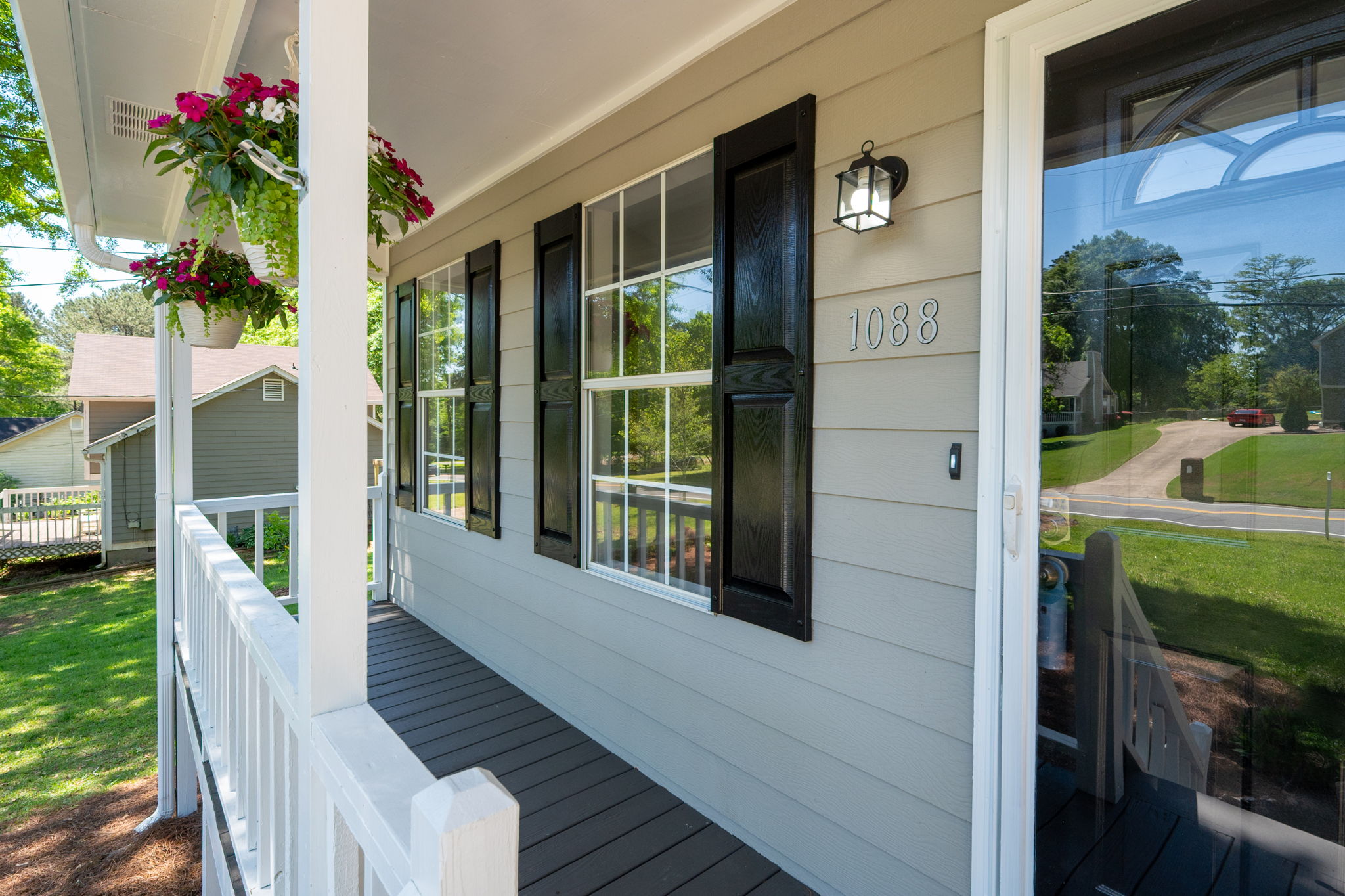 Sip your morning coffee on the newly painted front porch.