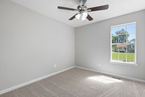 Third Bedroom features new paint, new carpet and a new ceiling fan.