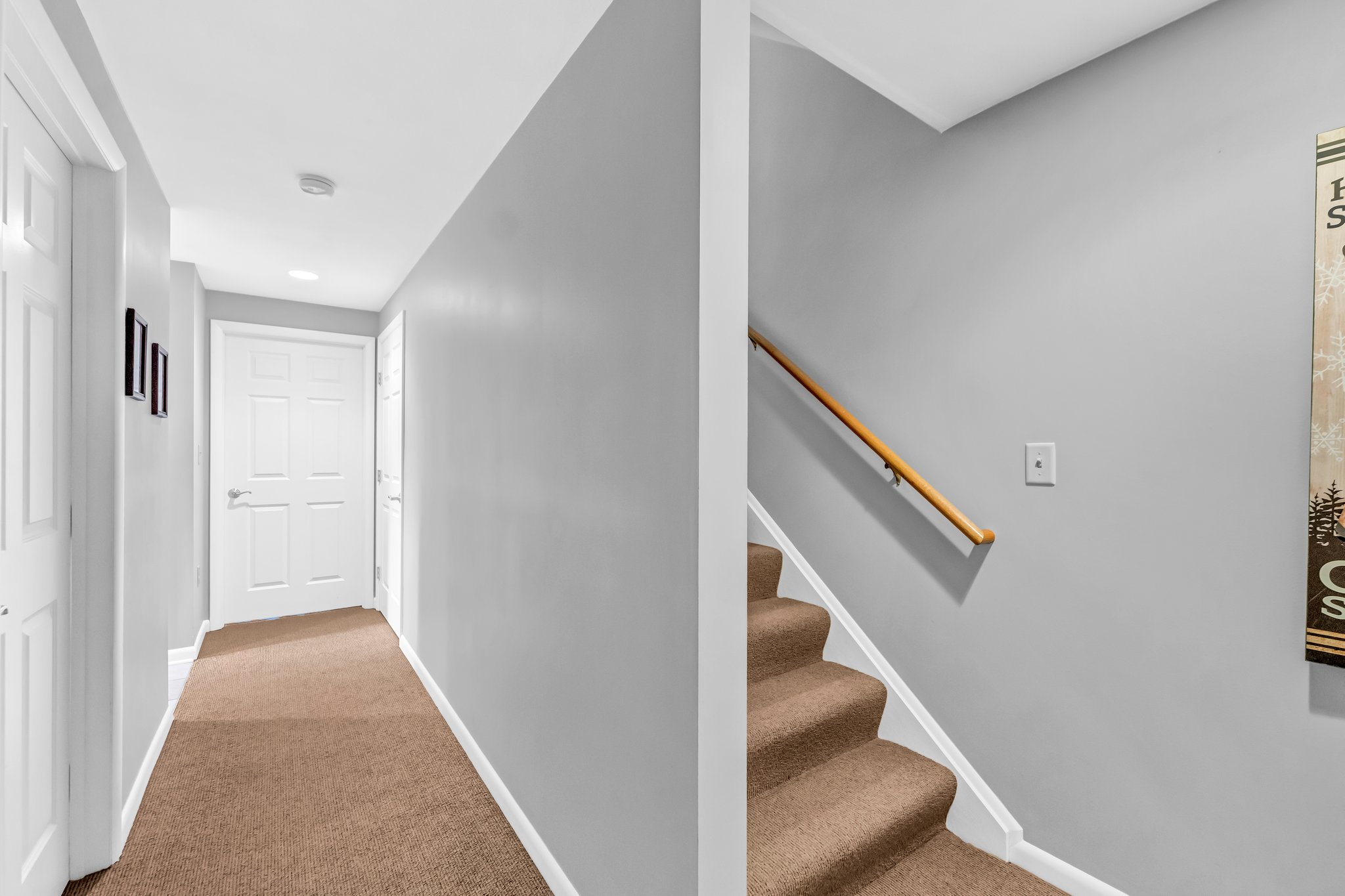 Lower level hallway w/utility closet & new w/d