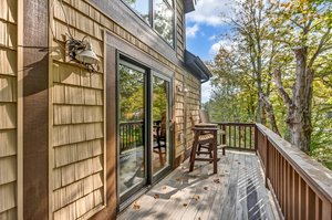 Deck off living room w/unobstructed views of the slope in winter