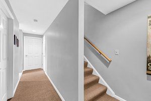 Lower level hallway w/utility closet & new w/d