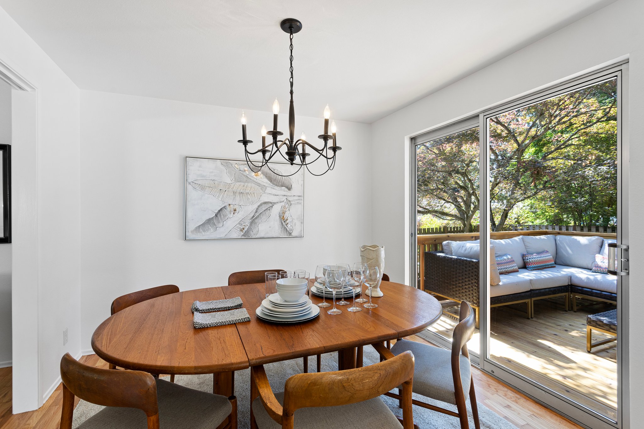 The dining room flows out to the sunny, spacious deck. The perfect floor plan for entertaining family and guests.