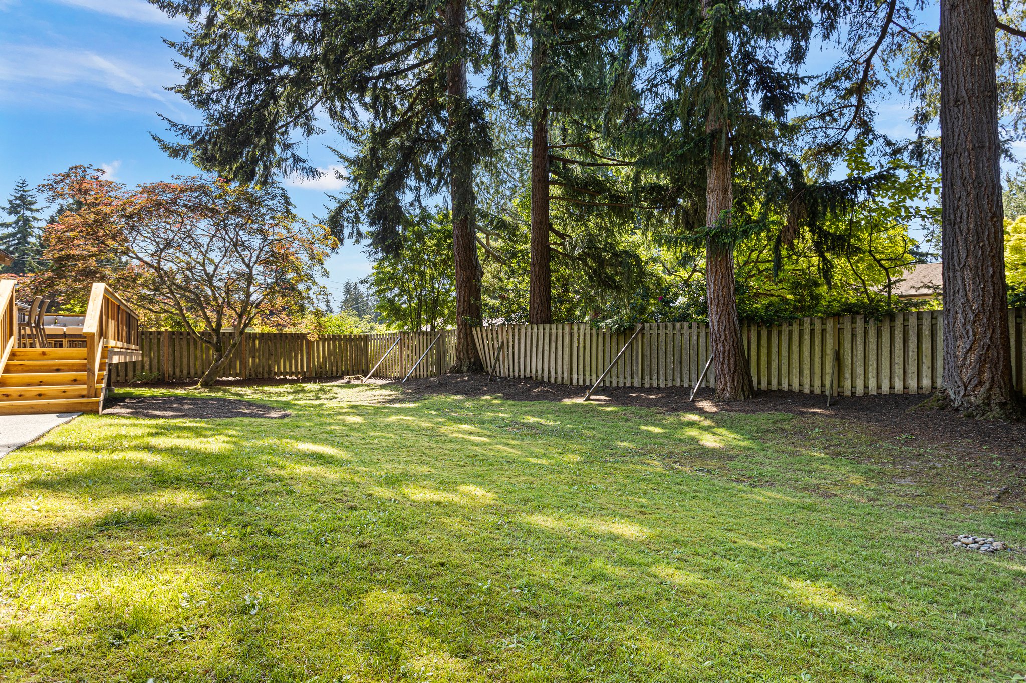The (almost) fully fenced backyard is spacious enough for gardening, pets, play, and whatever you need! Because there are about ten tall trees (mostly pine), during the sizzling summer, this house stays cool. But if it gets too hot, there is Central AC to count on. The house is surrounded by trees, providing plentiful fresh air and oxygen 24/7. From time to time, at night, when everything is quiet, there is the distant sound of a ship (quiet ‘bhooo’ sound) from Puget Sound, like living in a peaceful ocean town.