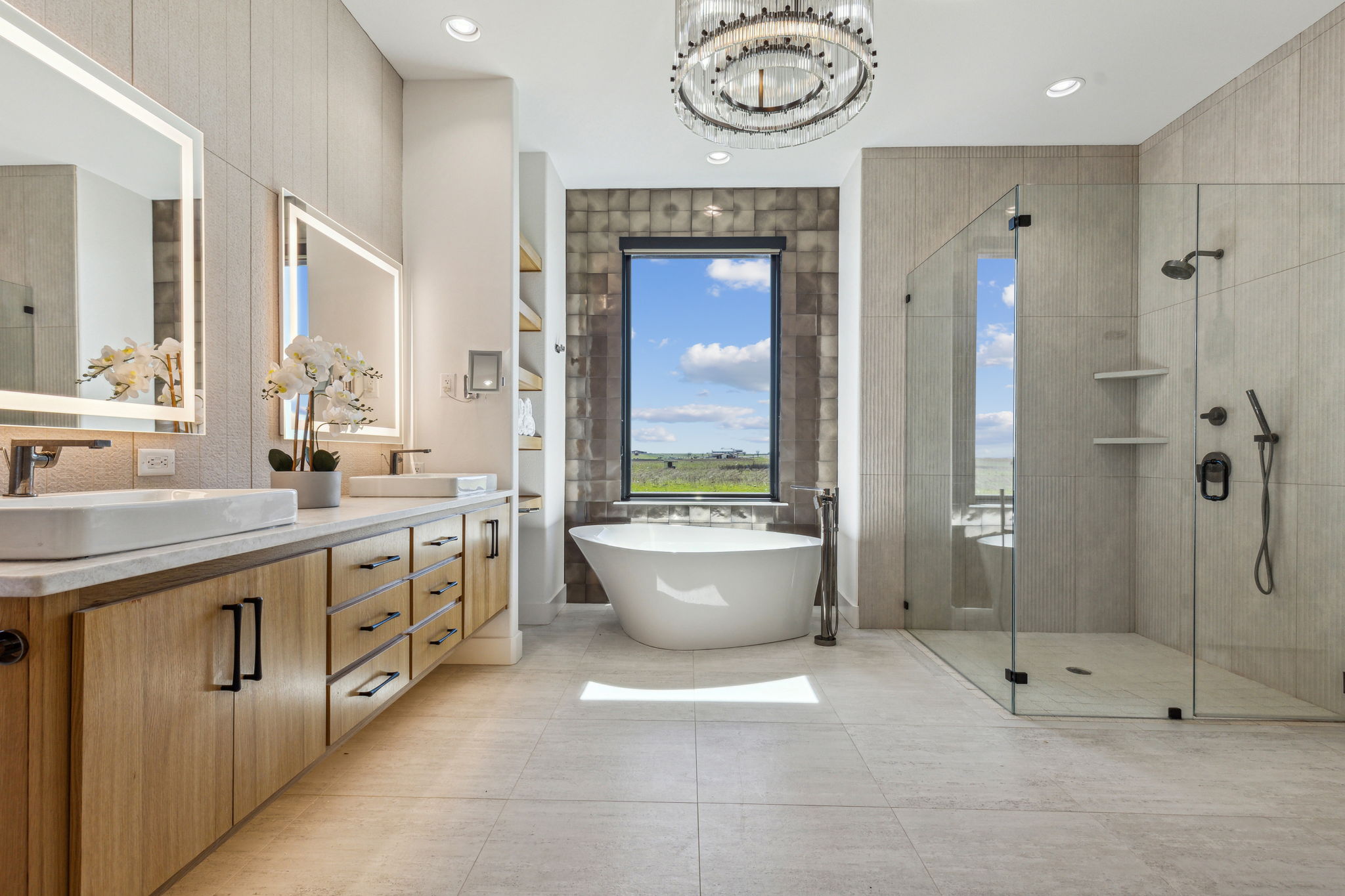 Ultra luxurious soaking tub and separate shower in Primary suite bathroom of the guest House