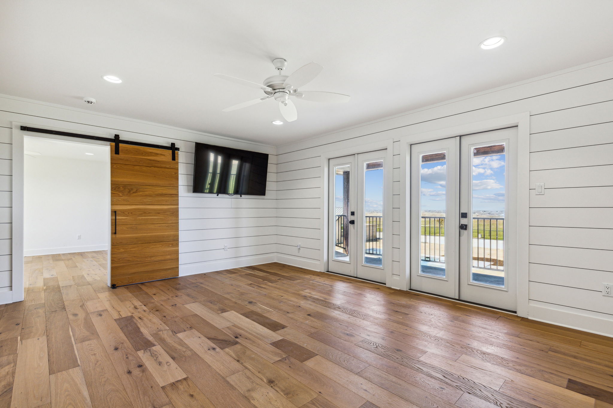 Office with balcony on the second level of the Guest House