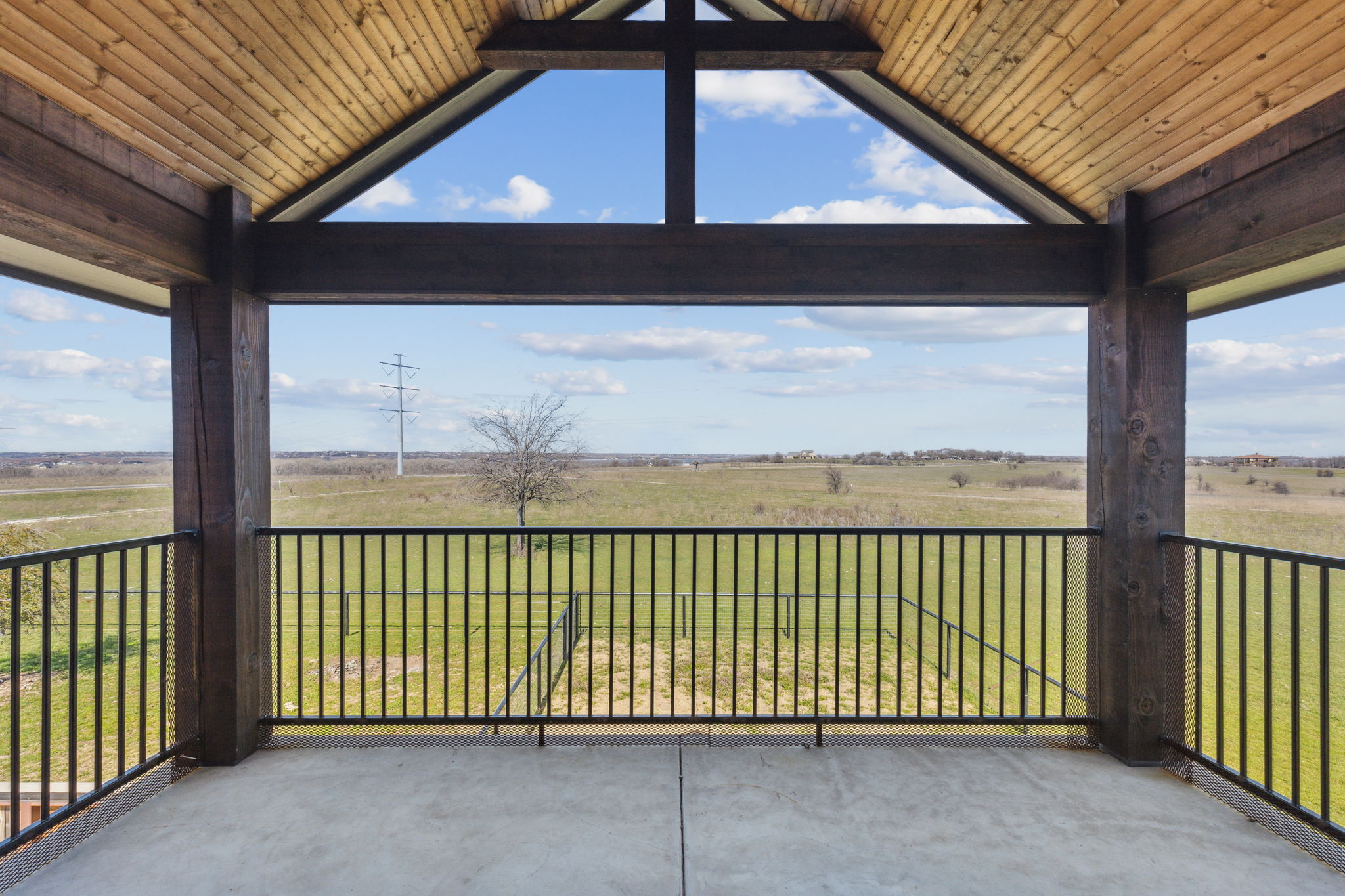 Balcony on the second level of the Man Cave with a North facing view of the Benbrook Lake
