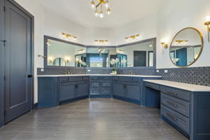 Double sinks and vanity of the Primary Suite bathroom in Main House