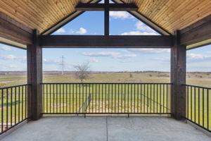 Balcony on the second level of the Man Cave with a North facing view of the Benbrook Lake