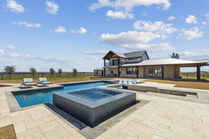 Glass mosaic tiled and rolled edge spa